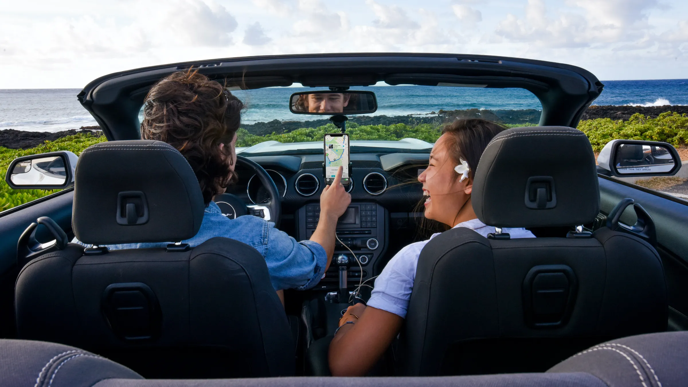 Shaka Guide app and brand hero imagery featuring Hawaiian island scenery