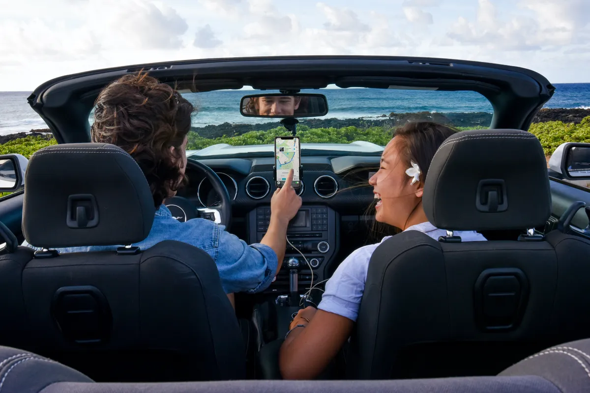 Shaka Guide app and brand hero imagery featuring Hawaiian island scenery